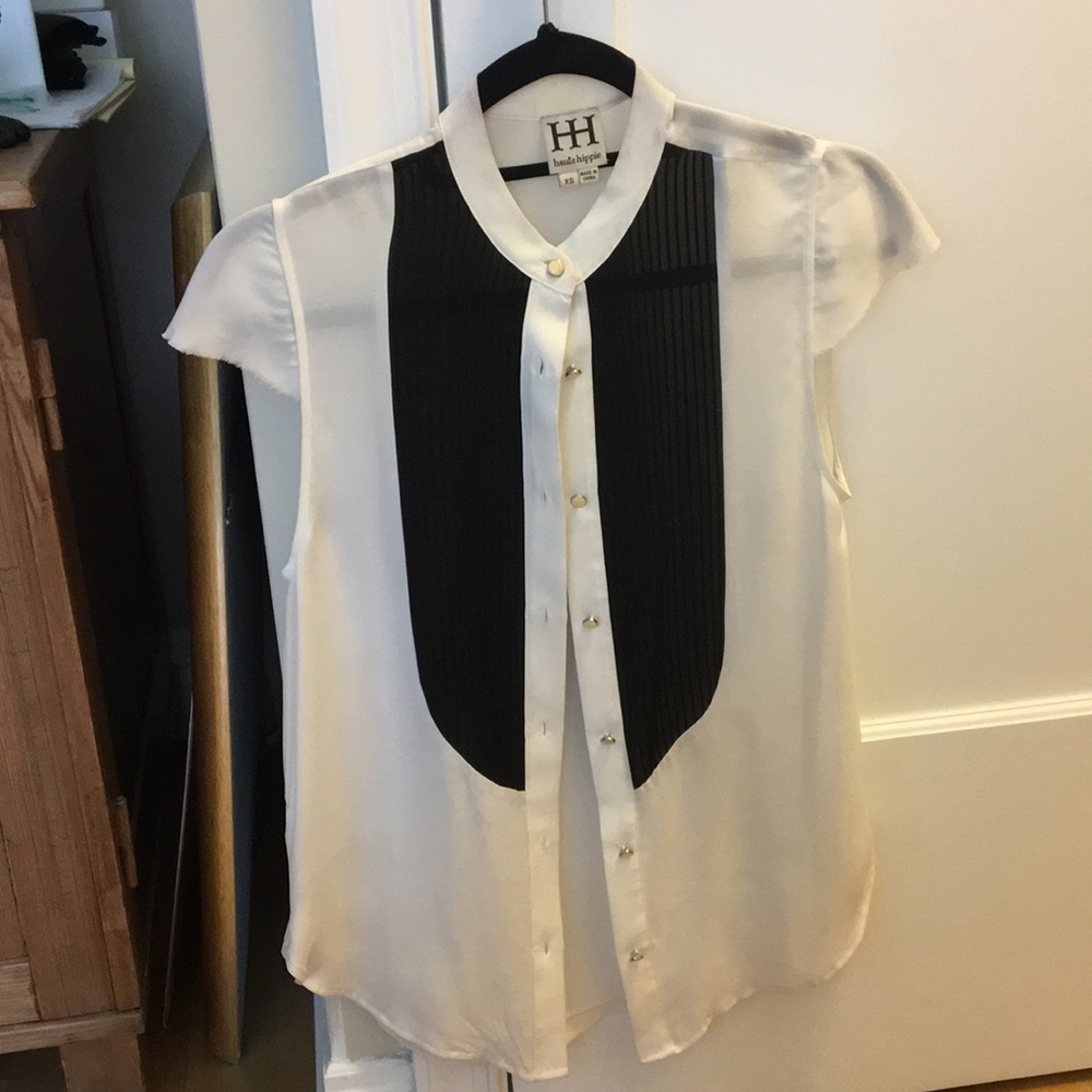 Pleated front blouse with subtle fringe detail